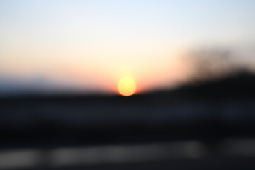 Blurred beautiful sunset background, blurred orange sunset scene