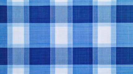 A close-up view of a blue and white checkered fabric pattern, showcasing a variety of shades and textures within the squares, Denim Texture woven  seamless.