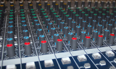 Audio mixing console close up. Professional audio mixer. Sound equipment.