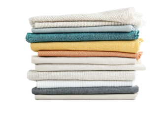 isolated transparent Background. Stack of cotton cloth napkins in neutral tones with colorful accents, neatly folded