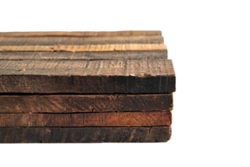 Stacked wooden planks display various textures and colors, suitable for construction or creative DIY projects. The arrangement emphasizes their rustic charm and natural beauty