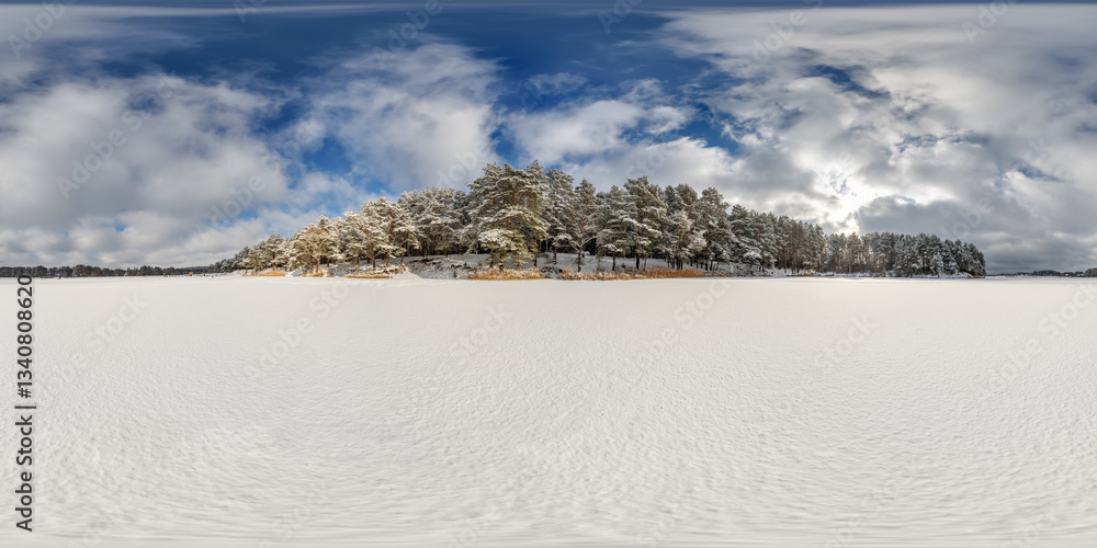 Wall mural winter full spherical 360 hdri panorama view on ice of frozen snow-covered lake in middle of forest 