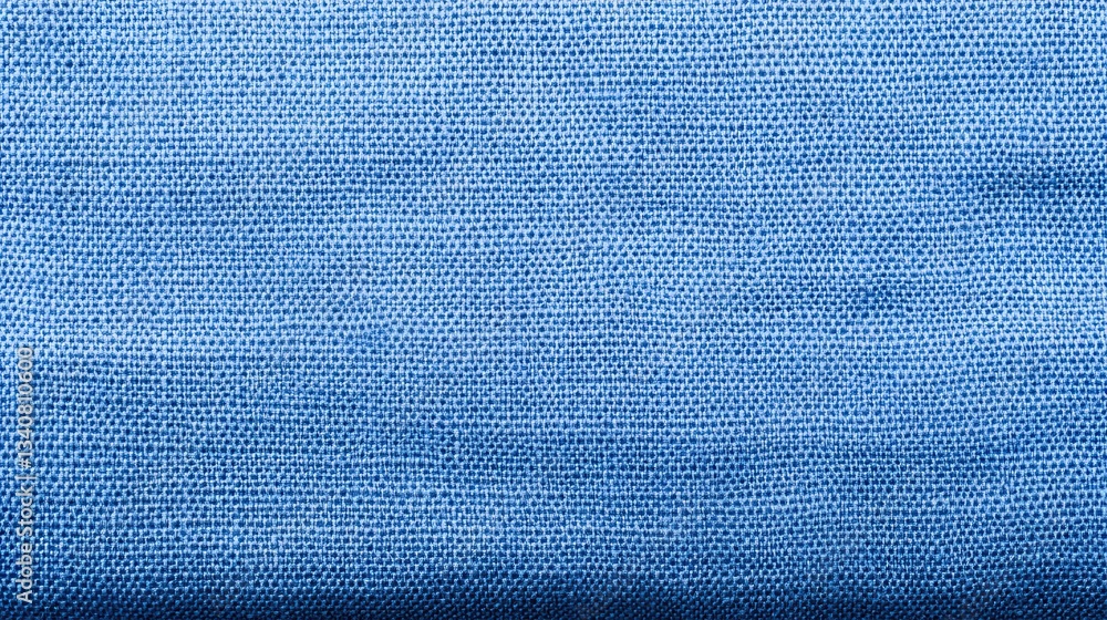 Aufkleber a close-up view of textured blue fabric, showcasing intricate weave patterns and subtle variations i