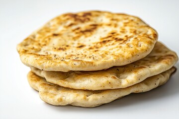 Fototapeta premium Stack of freshly baked naan flatbread on white background delicious Indian cuisine food photography