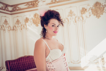 Fototapeta premium Elegant woman evokes past glamour and aristocratic style, showcasing a beautiful mix of historic and modern fashion