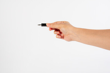 Hand and black audio cable aux isolated on white background