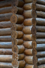 Corner Detail:  Stacked Timber Wall of a Log Cabin, Showing Interlocking Round Logs