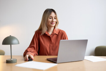Professional woman working on her laptop.