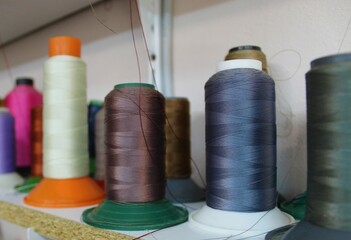 Colorful yarn on spool, yarn on tube, cotton, wool, linen thread