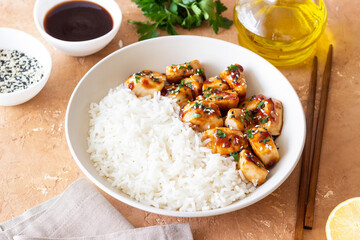 Chicken in teriyaki sauce with rice. Asian food. Healthy eating.