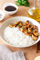 Chicken in teriyaki sauce with rice. Asian food. Healthy eating.