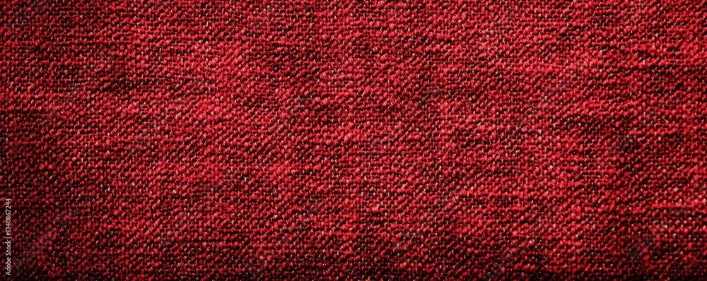 Aufkleber a close-up view of textured red fabric, showcasing a rich and intricate weave pattern, ideal for var