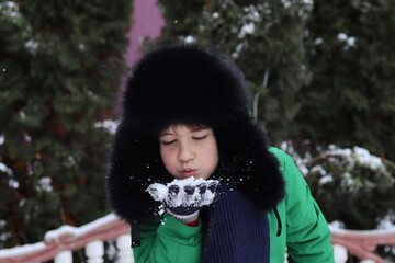 young boy in winter clothes