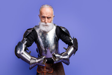 Elderly knight in full medieval armor posing against a vibrant purple background, evoking bravery...