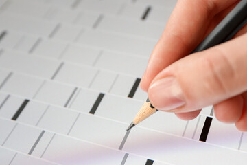 Scientist analyzing DNA data in laboratory, closeup