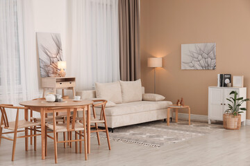 Beautiful furniture and decor in cozy living room. Interior design