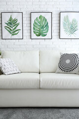 Comfortable white sofa in modern room. Interior design