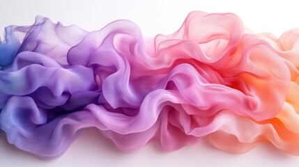 Fototapeta premium Colorful, flowing fabric with ombre effect in purple, pink, and orange shades.