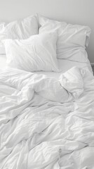 Soft white bedding creates a serene atmosphere in a bright, inviting bedroom during a sunny morning