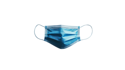 Protective mask hanging in mid-air, symbolizing safety and health awareness during a pandemic