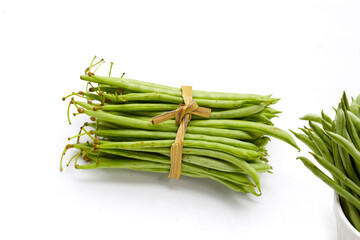 Fresh needle beans on white background