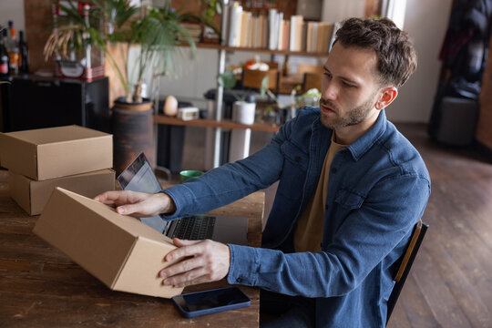 Entrepreneur checking an order before shipping 