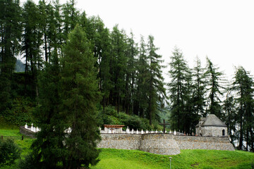 Tomb or Graves at Campanile di curon venosta vecchia or Submerged tower of reschensee church deep in Resias Lake