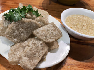 Fried Stuffed Pig Intestines or Guanchang. It actually make from mung bean paste.