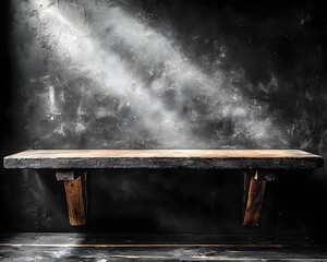 A moody minimalist wooden table against a dramatic backdrop