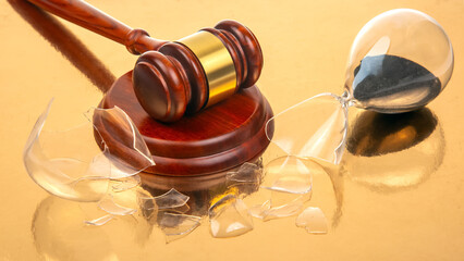 Close-up of a polished gavel next to a broken hourglass with dark sand, on a golden surface,...