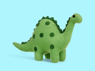 Cute little baby dinosaur soft toy on the blue background