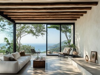 A living room with a large window overlooking the ocean. A couch is in the room with a coffee table in front of it. There is a chair and a potted plant in the room. A framed picture is on the wall