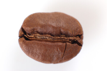 Close-up of a single roasted coffee bean with a cracked surface, showcasing its rich brown texture against a clean white background. Perfect for coffee-related content.