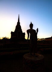 Sukhothai Buddha and Chedi at Twilight