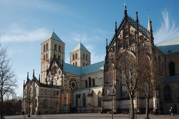 Fototapeta premium Outdoor exterior sunny view of St.-Paulus-Dom, Domplatz Münster and Münster Cathedral in Münster Germany. 