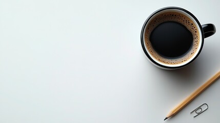 Minimalist white desk with a black mug of coffee, a pencil, and a paper clip on the right side, against a white background, high-resolution photography