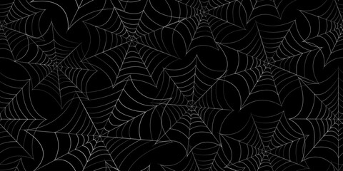 seamless spider web pattern on black background, spooky Halloween texture for fabric, wallpaper, wrapping paper, invitations, decorations, and textile design