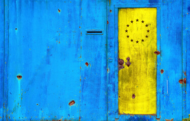 closed old doors in the color of the national flag of Ukraine with the symbol of the European Union