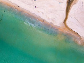 Top view Beautiful beach nature sea,Amazing landscape waves crashing on sand in summer background,Wide angle drone shot
