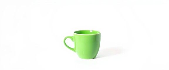 A bright green empty coffee cup sits alone against a stark white background, beverage, mug