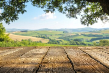 Scenic View of Green Hills and Blue Sky from a Rustic Wooden Table with a Grassy Landscape Background