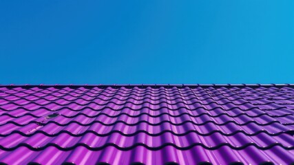 Naklejka premium Vibrant Purple Roof Tiles Against a Clear Blue Sky, Architectural Detail of a Modern Home Exterior