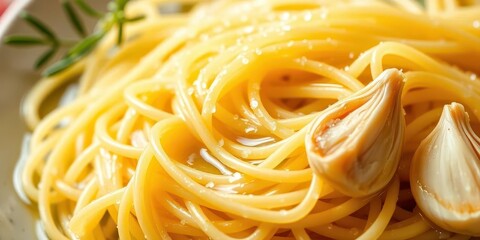 Delicate angel hair pasta, glistening olive oil, fragrant garlic cloves, glossy, overhead shot