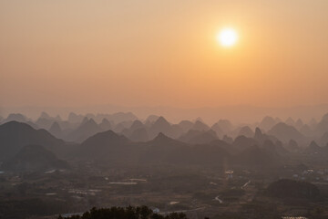 Golden Sunset Over Karst Mountains in Guilin.