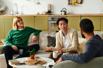 Engaging discussions among young men in a cozy book club setting at home