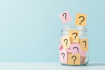 Creative question mark notes in glass jar against pastel background