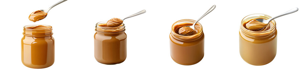 Several glass jars filled with smooth amber colored peanut butter and metal spoons dipping into the spread
