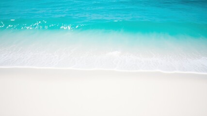 Serene turquoise ocean waves gently lapping on a pristine white sand beach
