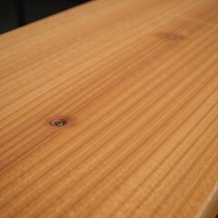 Fototapeta premium Close-up image showcasing intricate oak wood grain patterns bathed in warm natural light