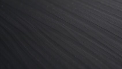 Close-up view of black textured plastic material